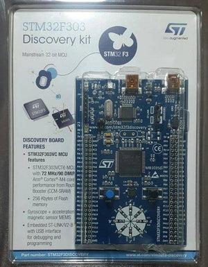 Stm Discovery Kit STM32F3 STM32F303VC With Programming Cable - original plastic retail packaging, showing a blue development board with a central chip, buttons, and LED array.