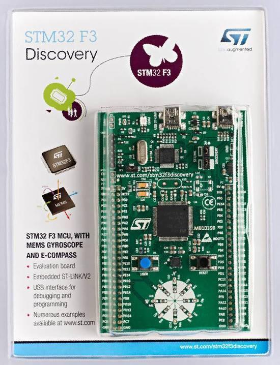 Stm Discovery Kit STM32F3 STM32F303VC With Programming Cable - original retail packaging, showing a green development board with a central chip, buttons, LEDs, and USB ports.