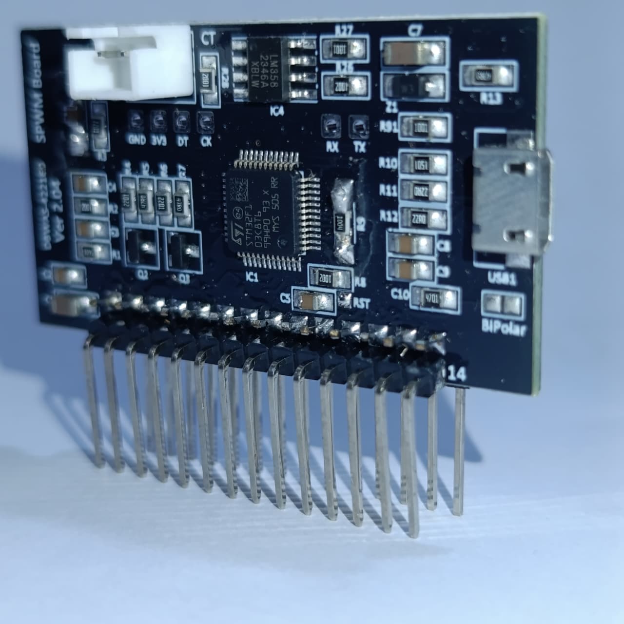 STM Sinewave Inverter Drive Module Grid Sharing With CT - a black rectangular circuit board with a micro-USB port, pin headers, and onboard components.