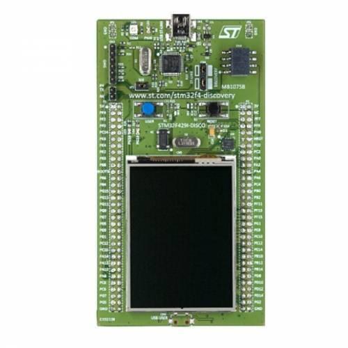 STM32F429 439 Arm Cortex M4 Development Kit - a green printed circuit board with a central black display, two buttons, and top and bottom USB ports.