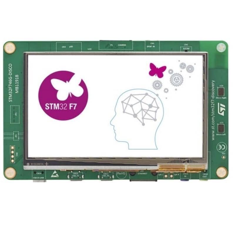 STM32F746G Disco Discovery Board Kit - a rectangular green circuit board with a central touchscreen display showing an STM32 F7 logo and brain graphic.