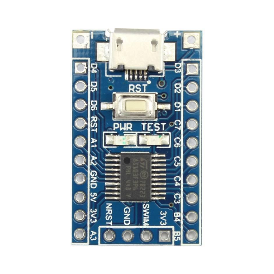STM8S003F3P6 STM8 Minimum Development Board - a blue rectangular circuit board featuring a micro-USB port, a reset button, and various pin headers.