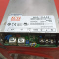 Stock Lot 24V 40A Power Supply - a silver rectangular unit with a terminal block for AC input, DC output, and a voltage adjustment knob on the front panel.
