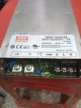 Stock Lot 24V 40A Power Supply - a silver rectangular unit with a terminal block for AC input, DC output, and a voltage adjustment knob on the front panel.