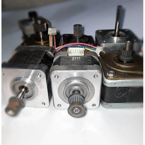 Stock Lot Used A4988 Compatible NEMA 17 Stepper Motor NEMA17 - a collection of metallic square stepper motors with attached pulleys and wire connectors.