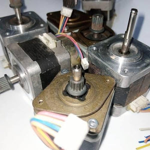 Stock Lot Used A4988 Compatible NEMA 17 Stepper Motor NEMA17 - a collection of silver and bronze metallic stepper motors with attached wiring harnesses.