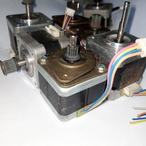 Stock Lot Used A4988 Compatible NEMA 17 Stepper Motor NEMA17 - a collection of used silver and black square motors with attached metal shafts, gears, and multi-colored wiring harnesses.