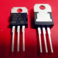 STP75NF75 75NF75 Power MOSFET - shown as two black, three-pin electronic components with metal heatsink tabs, set against a solid red background.