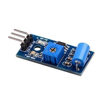 Sw-420 Vibration Sensor - a blue rectangular potentiometer, a blue cylindrical sensor, and a three-pin header on a blue circuit board.