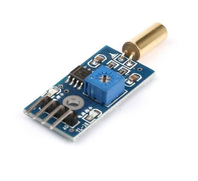 SW520D SW-520D Angle Sensor Module Ball Switch Tilt Sensor Module - a blue circuit board with a gold-coloured cylindrical sensor, a blue potentiometer, and a four-pin header connector.