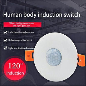 Switch 120 Degree Ceiling Recess PIR Infrared Human Body Motion Sensor Light Bulb Switch - a round white sensor with orange mounting clips.