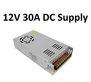 Switching DC Power Supply SMPS 12V 30A 360W - a silver rectangular metal unit with a cooling fan, side vents, and a terminal block with screw connectors.