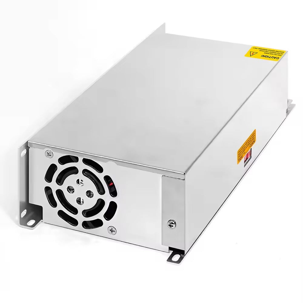 Switching Power Supply 68V 14.7A - a silver rectangular metal power supply unit featuring an integrated cooling fan and side-mounted voltage selection switch.