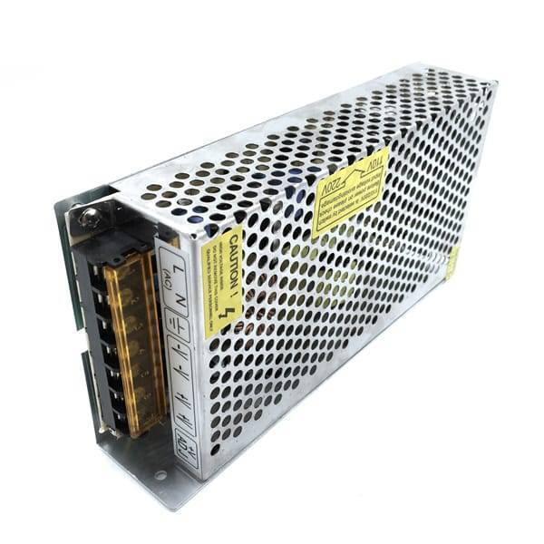 Switching Power Supply SMPS 12V 10A - a silver metal unit with a perforated cover, featuring a side terminal block for AC input and DC output connections.