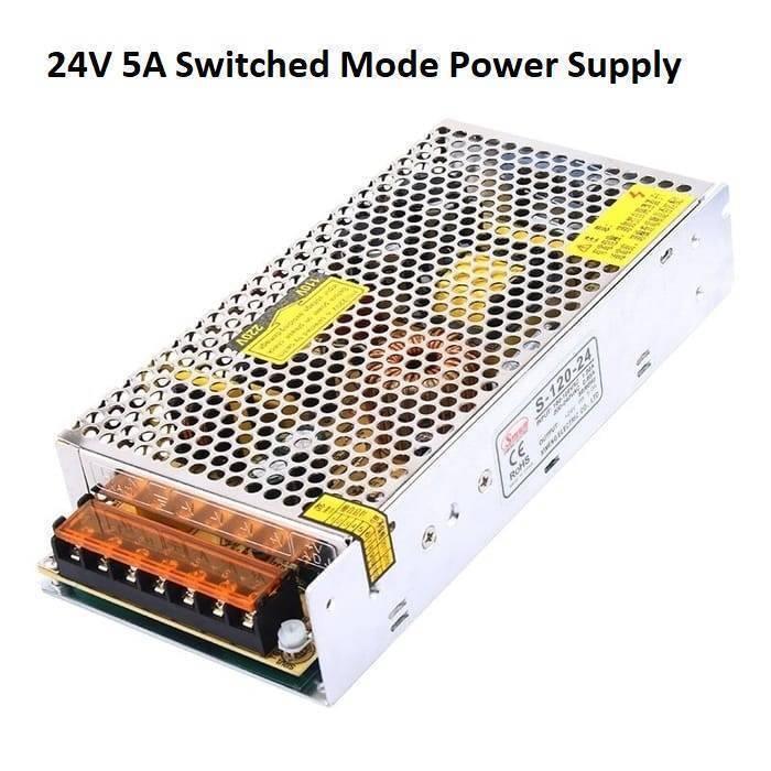 Switching Power Supply SMPS 24V 5A - S-120-24 switched-mode power supply in a vented steel case, with the orange-covered screw terminal block and specification label visible.