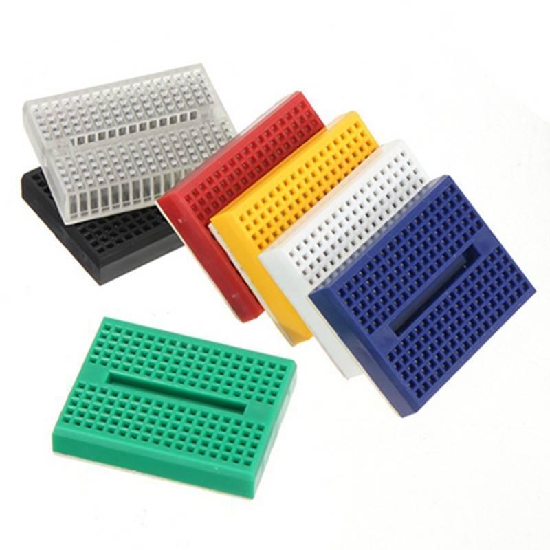 Syb-170 SYB170 Syb 170 Solderless Mini Breadboard - a collection of six small rectangular breadboards in clear, black, red, yellow, white, and blue colors.