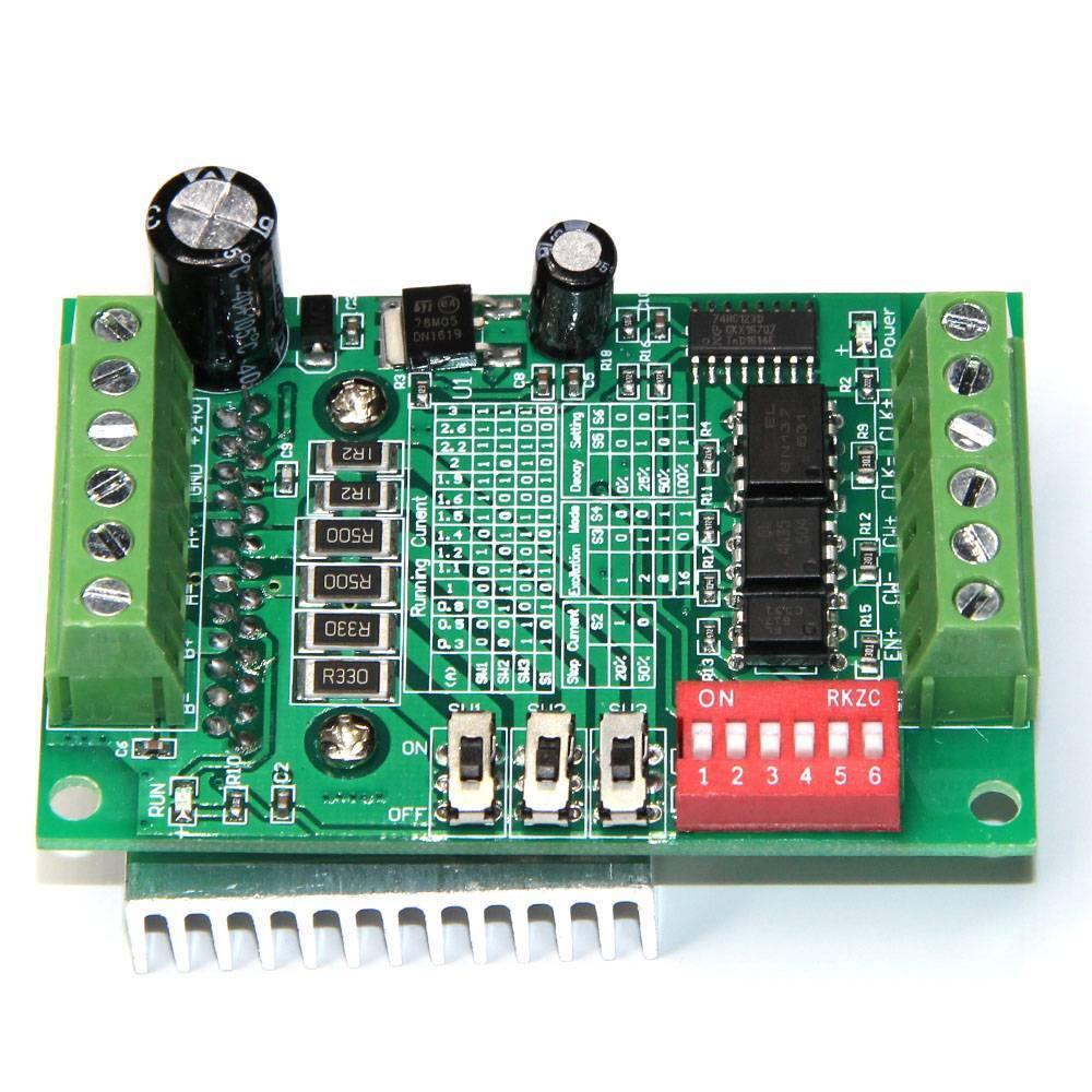 TB6560 Single Axis 3A Stepper Motor Driver - a green circuit board with screw terminals, a red six-switch DIP block, three toggle switches, and a heatsink.