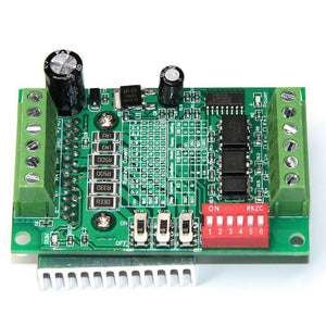 TB6560 Single Axis 3A Stepper Motor Driver - a green circuit board with screw terminals, a red six-switch DIP block, three toggle switches, and a heatsink.