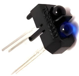 TCRT5000 Reflective IR Sensor - a black plastic housing with a blue LED and a black infrared emitter, featuring four metal connection pins.