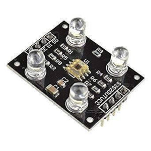 TCS3200 Color Sensor Module - a black rectangular circuit board featuring four LEDs, a central sensor chip, and two rows of pin headers.