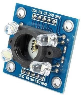 TCS3200 Color Sensor Module With Cap - blue square circuit board featuring a central sensor, four white LEDs, and two rows of labeled pin headers.