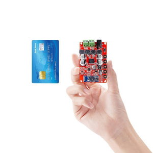 TDA7492 12V 24V 50W + 50W Wireless Bluetooth 4.0 Audio Receiver Board 2x50w Digital Amplifier Module - held in a hand next to a credit card for scale, showing capacitors, a power jack, and terminal blocks.