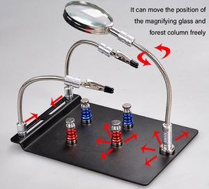TE-804 Soldering Third Hand Magnetic Universal PCB Motherboard Fixture With Magnifier - a black metal base, two flexible arms with clips, and a magnifying glass.