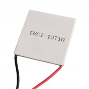 TEC1 12710 Thermoelectric Cooler Peltier Module 12VDC 10A 40x40x3.2mm - a square white ceramic plate with printed text and one black and one red wire extending from the side.