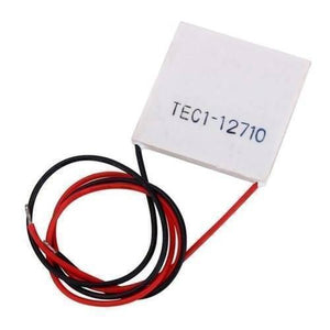TEC1 12710 Thermoelectric Cooler Peltier Module 12VDC 10A 40x40x3.2mm - a white square module with red and black wires attached, shown against a plain white background.