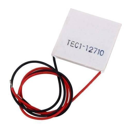 TEC1 12710 Thermoelectric Cooler Peltier Module 12VDC 10A 40x40x3.2mm - a white square module with red and black wires attached, shown against a plain white background.