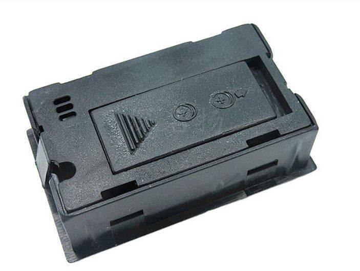 Temperature And Humidity Meter - shown from the back, featuring a black rectangular plastic housing with a battery compartment cover and two circular buttons.