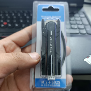 TEUCER M.2 SSD Heatsink NVME 2280 - Aluminum Cooling Radiator for Desktop PC & PS5 - shown inside its clear plastic retail packaging with a visible 3-pin connector.