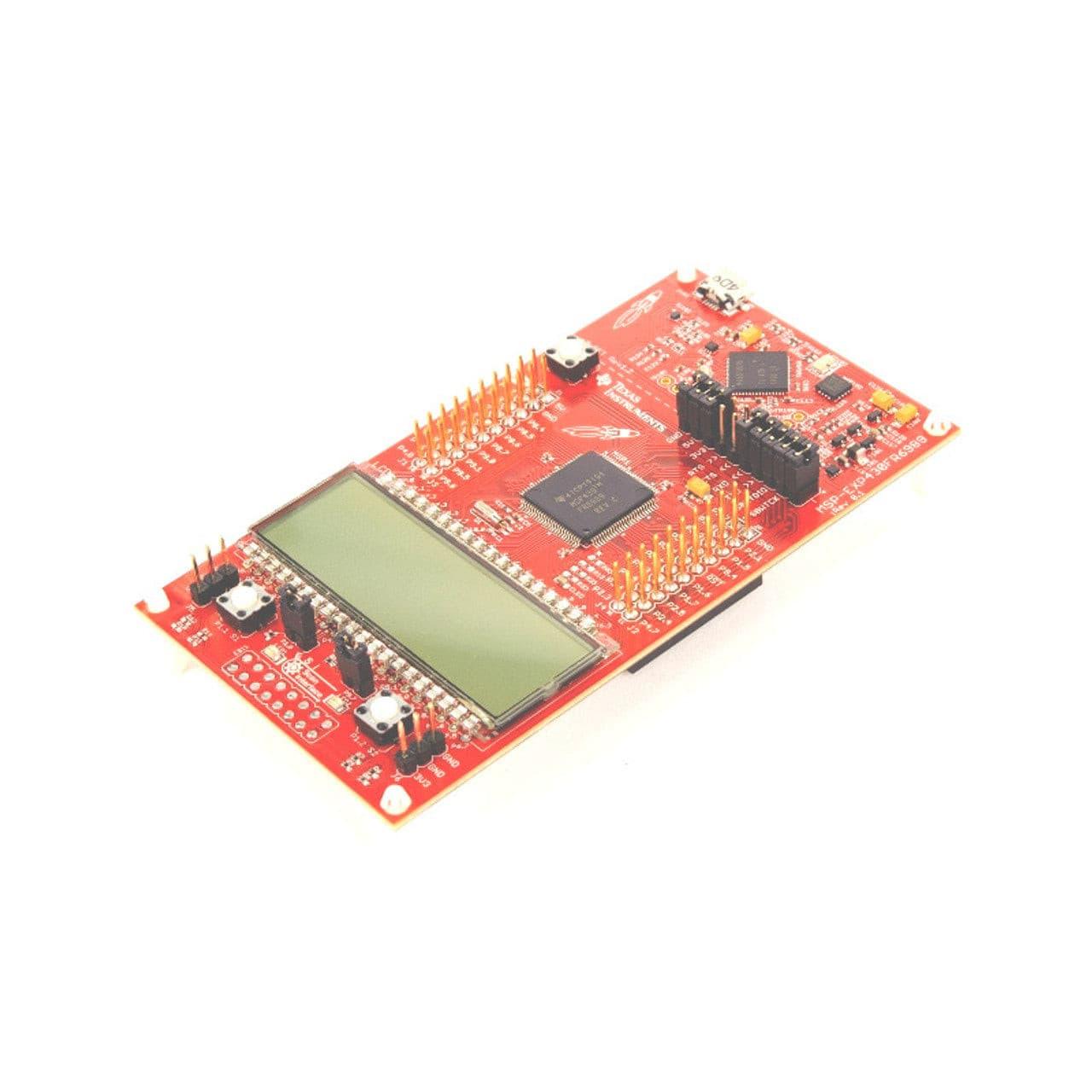 Texas Instruments MSP-EXP430FR6989 Dev Kit, Launchpad, MSP430FR6989 MCU, Energytrace - a red circuit board featuring an integrated LCD screen, two push buttons, and pin headers.