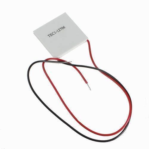 Thermoelectric Cooler Peltier Module TEC1-12706 12VDC 6A Cooling Refrigeration Plate - a square white plate with a red and a black wire attached.