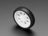 Thin White Wheel for TT DC Gear Motors - 65mm Diameter - shown as a single round wheel with a white plastic rim and a black rubber tire with tread.