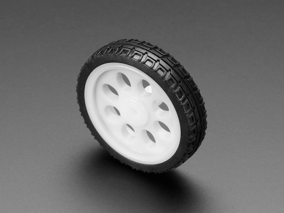 Thin White Wheel for TT DC Gear Motors - 65mm Diameter - shown as a single round wheel with a white plastic rim and a black rubber tire with tread.