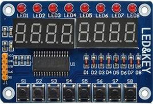 TM1638 8 Digit 7 Segment Display With LED’s And Switches - a blue circuit board with eight red LEDs, two four-digit displays, eight buttons, and pins.