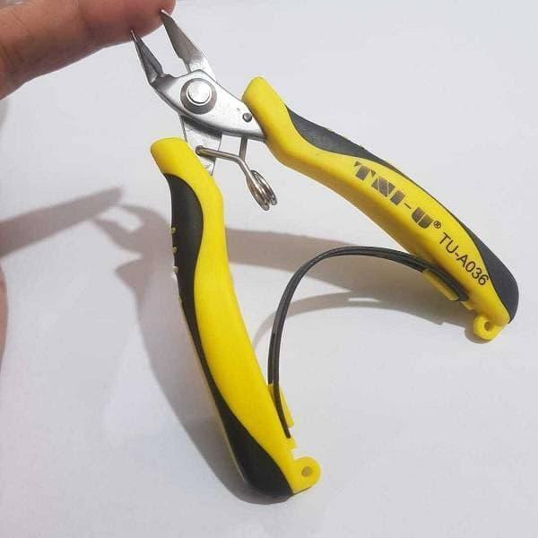 Tni-u Mini Ergonomic Palm Held Smart Locking Pliers Cutter TU-A036 - with yellow and black handles, a metal cutting head, and a spring-loaded locking mechanism.
