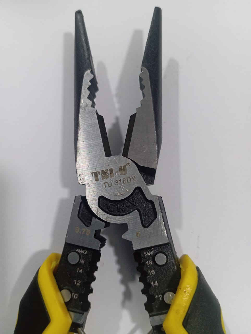 TNI-U TU318DY Noze plair Price - a black and yellow multi-functional tool featuring wire stripping gauges in AWG and MM sizes on its handles.