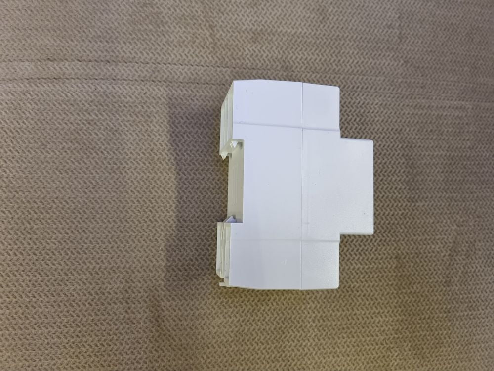 Tomzn 63A WiFi Smart Switch Tuya Energy Meter kWh Metering Circuit Breaker Timer With Voltage Current And Leakage Protection - a white DIN-rail mountable electrical device shown from the side profile.