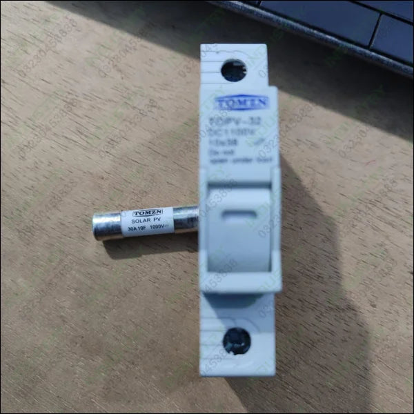 TOMZN TOPV-32X DC 1100V PV Fuses for Solar System Protection - holder in white plastic with a cylindrical 30A 1000V solar PV fuse placed horizontally next to it.