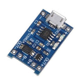 TP4056 1A Li-ion Battery Charging Board Micro USB With Current Protection BMS - a blue rectangular circuit board featuring a micro USB port, surface-mount components, and labeled terminals.