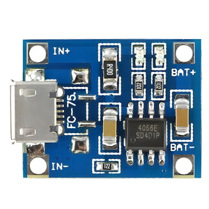 TP4056 Lithium Battery And 18650 Charger Module 1A 3.7V - a blue rectangular circuit board featuring a micro-USB port, a 4056E chip, and labeled IN and BAT terminals.