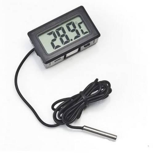 TPM10 Digital Thermometer Temperature Sensor Tester Meter Fy-10 With Metal Sensor - a black rectangular display reading 28.9°C connected by a black wire to a silver metal temperature sensor probe.
