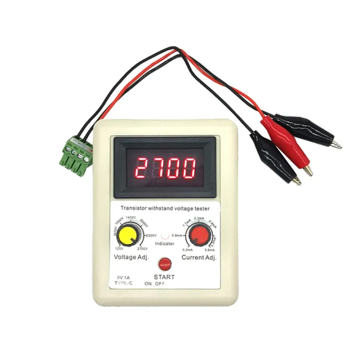 Transistor Withstand Voltage Tester - a beige rectangular unit with a red digital display reading 2700, two knobs, a button, and alligator clips.