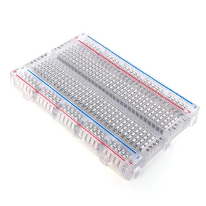 Transparent Clear Breadboard 400 Tie-Points 4 Power Rails - shown as a single, clear plastic rectangular breadboard with numbered rows and lettered columns.