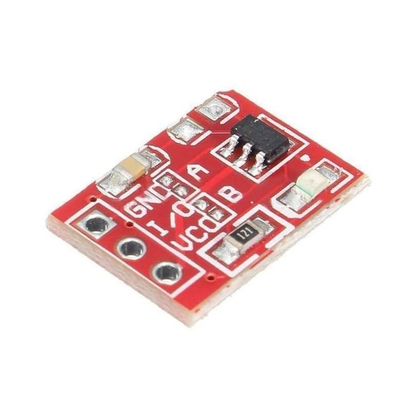 TTP223 Touch Sensor Module Touch Sensor For Arduino And Raspberry Pi - a small red rectangular circuit board featuring a touch pad, a black integrated circuit, and three labeled pin holes.