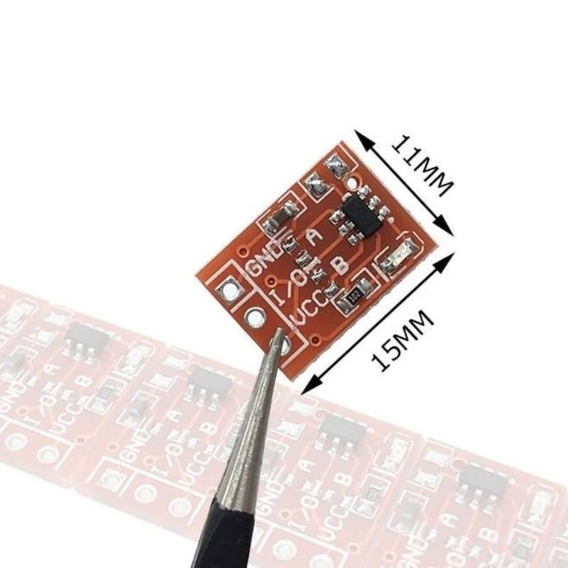 TTP223 Touch Sensor Module Touch Sensor For Arduino And Raspberry Pi - a small rectangular red circuit board with four pin holes, held by tweezers with 11mm by 15mm dimensions indicated.