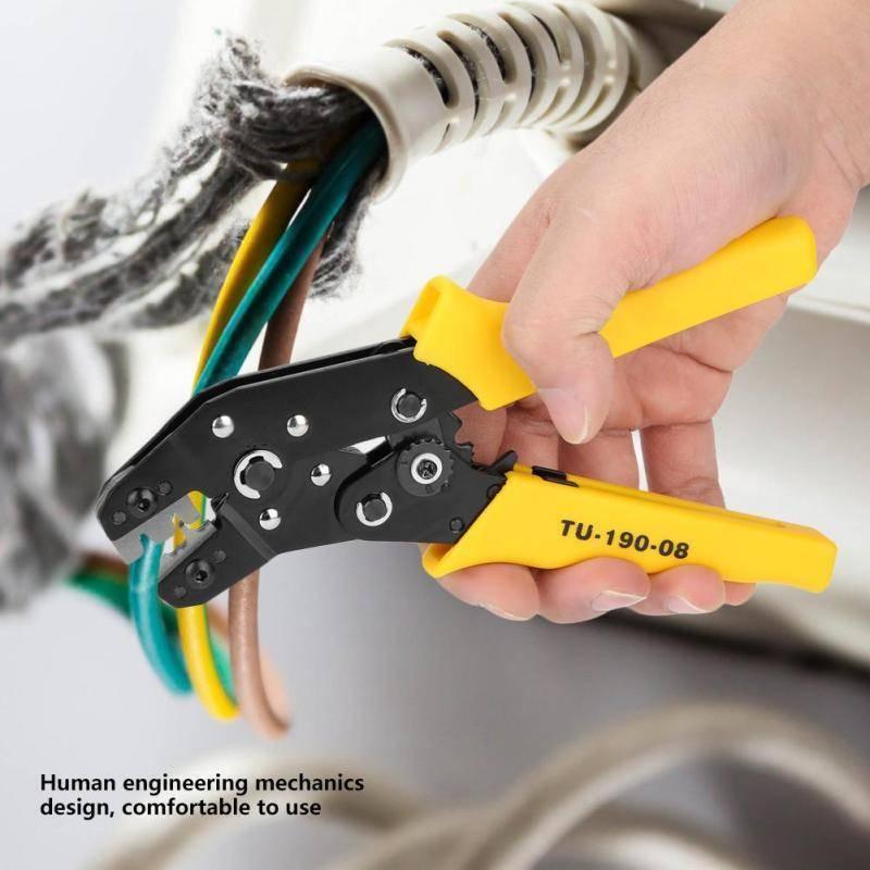 TU-190-08 Terminals TU Tool Crimping Tool Crimping Cable Cutter for 24AWG-10AWG 0.08-0.5sq.mm - a black metal hand tool with yellow handles, being used to crimp a multi-coloured wire cable.