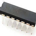 ULN2003 IC - a black rectangular integrated circuit with sixteen metal pins arranged in two parallel rows, shown from a high-angle perspective.